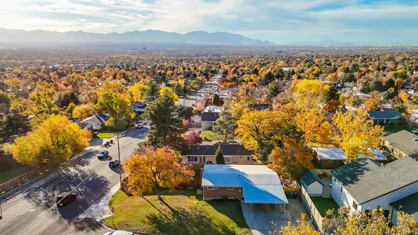 Aerial view of residential area with a mountainous background