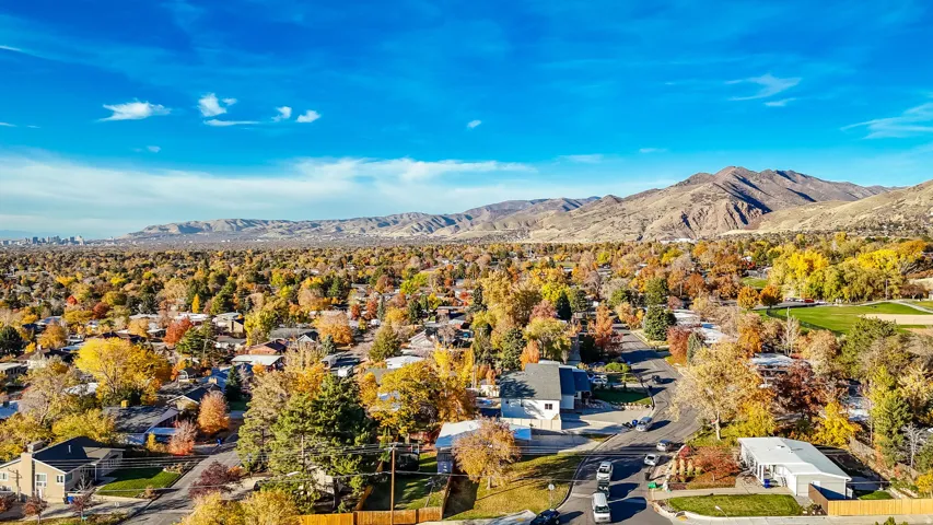 Aerial perspective of suburban area featuring mountains