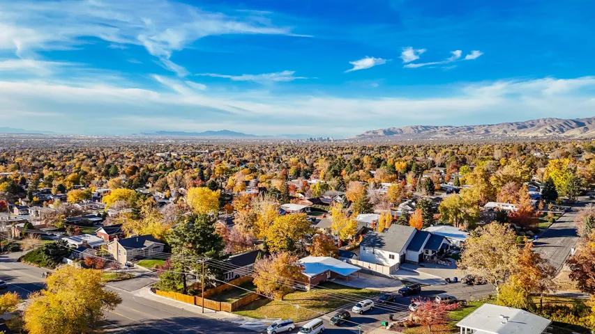 Aerial view of residential area featuring mountains