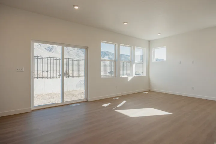 Unfurnished room featuring light wood finished floors and recessed lighting