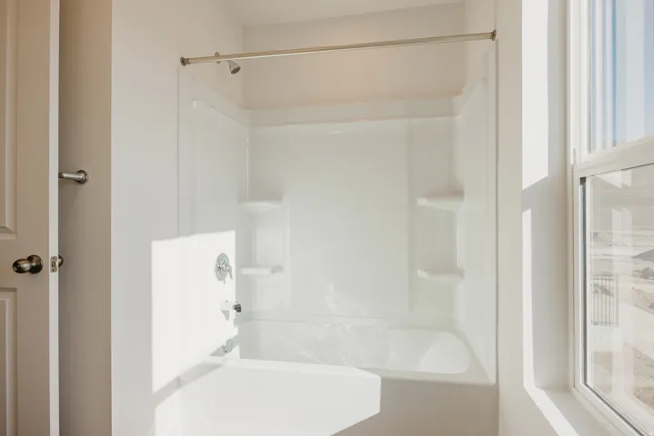 Bathroom featuring shower / bathtub combination