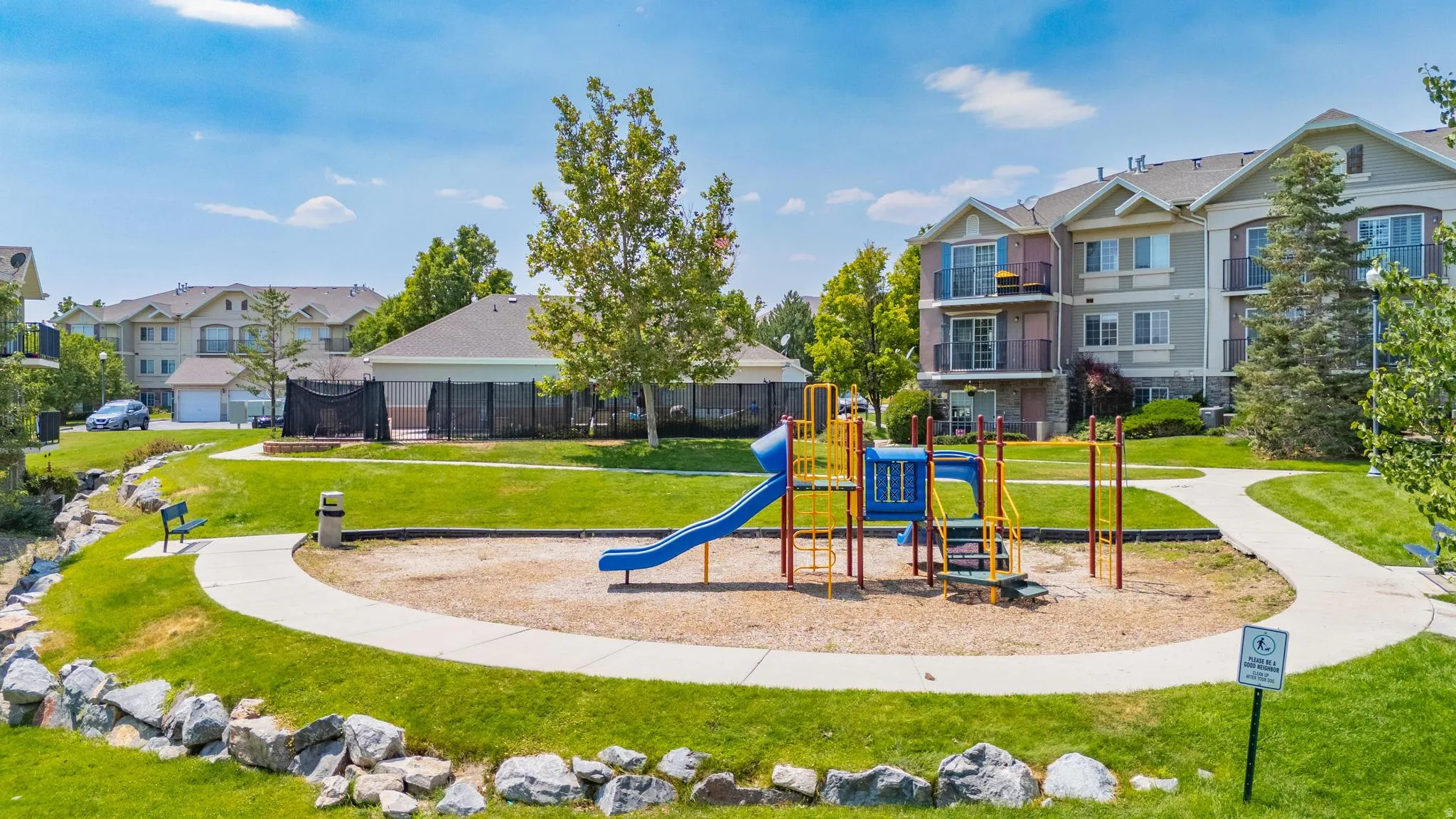 Community play area with a residential view