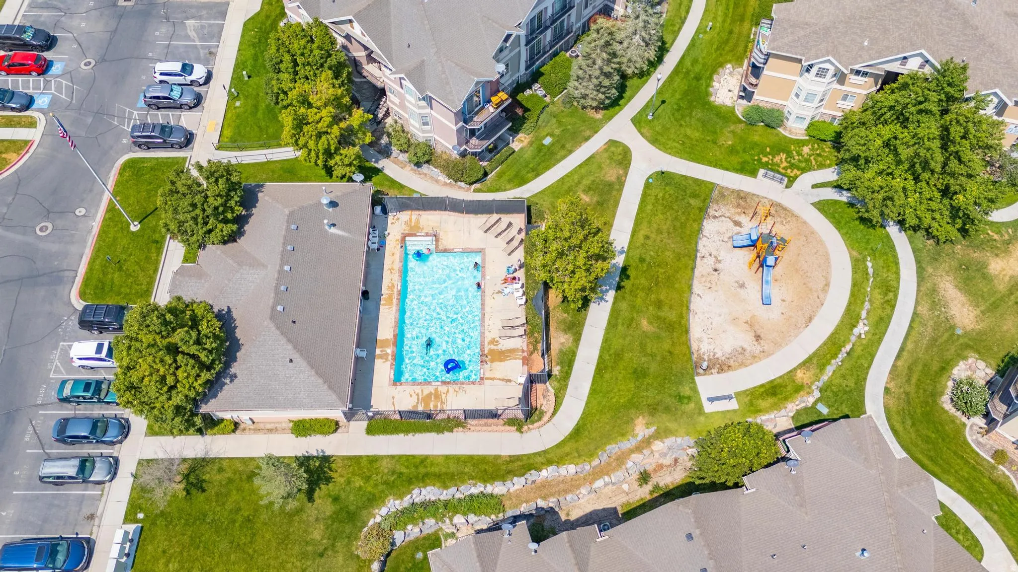 View of property location with a pool area
