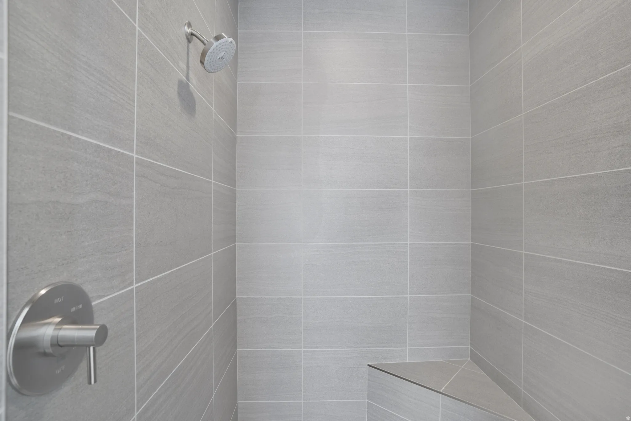 Bathroom view of tiled shower