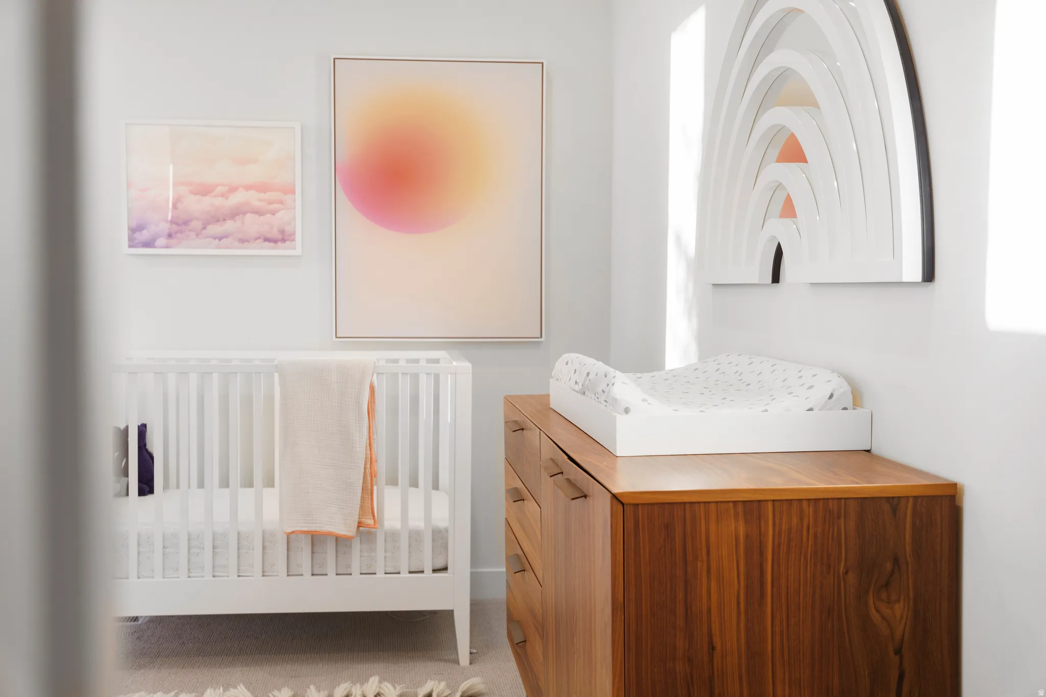 Bedroom featuring a crib