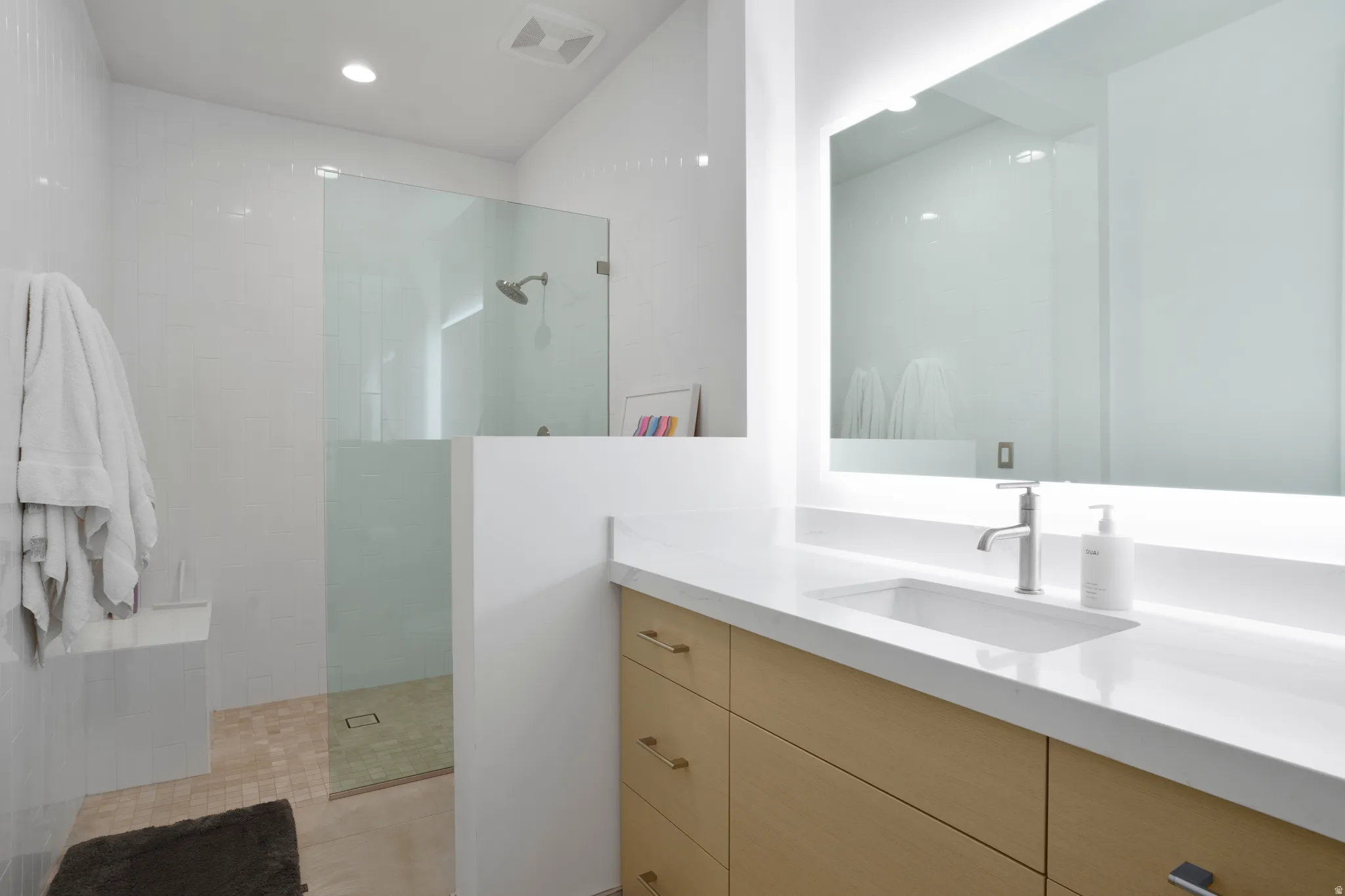 Full bath with walk in shower, vanity, and recessed lighting