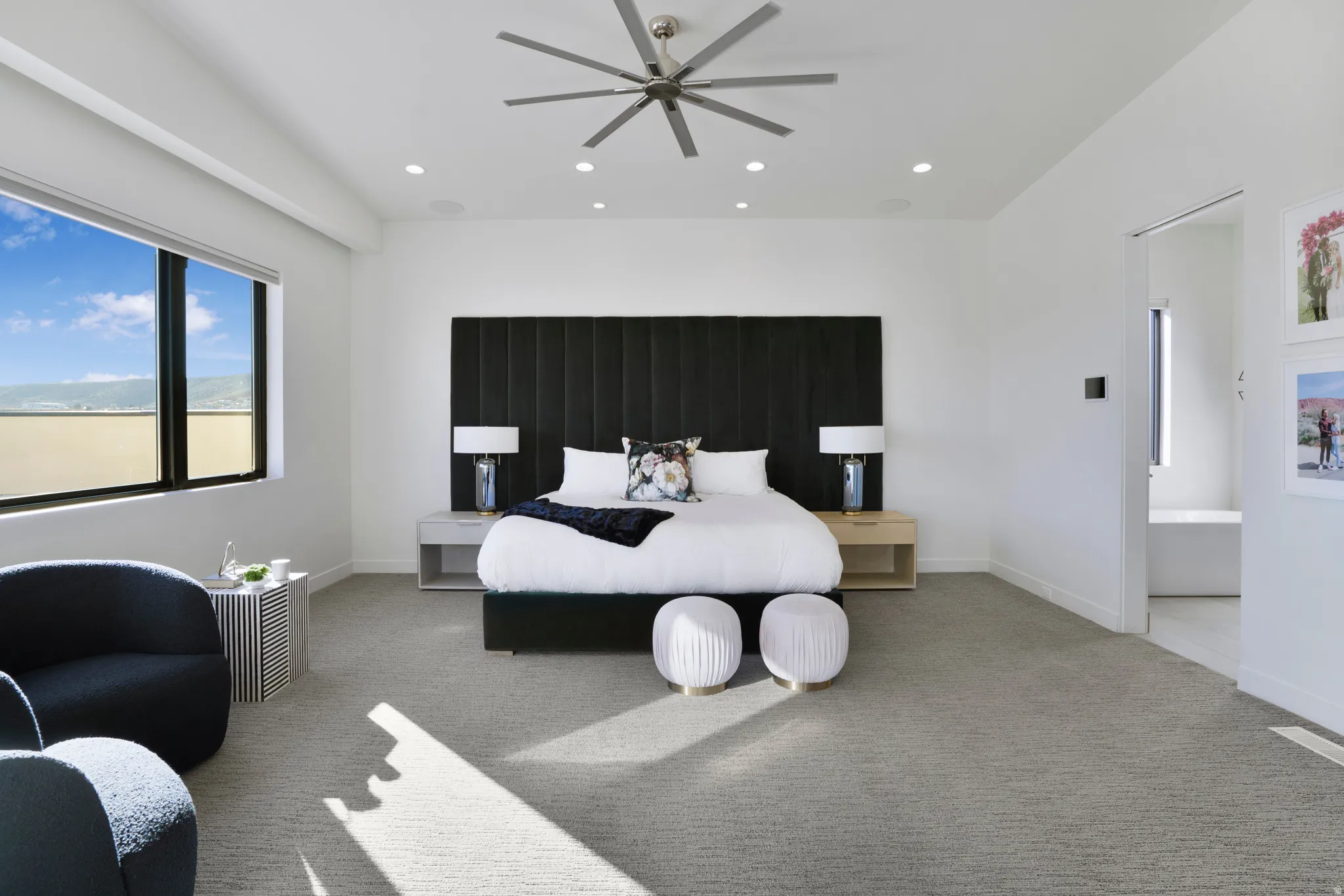 Carpeted bedroom with recessed lighting and ceiling fan