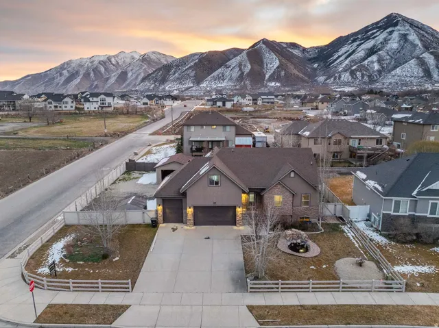 Aerial view of residential area featuring a mountain backdrop