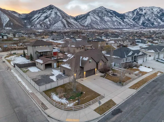 Aerial view at dusk of a mountain view and a residential view