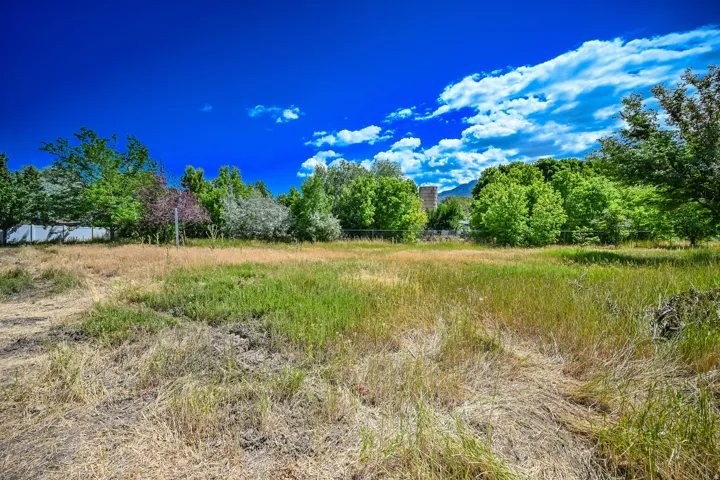 View of undeveloped land with mountains and rural landscape