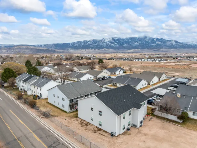 Aerial perspective of suburban area with mountains