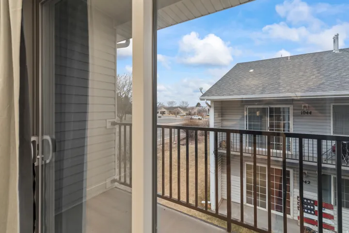 Balcony featuring a residential view