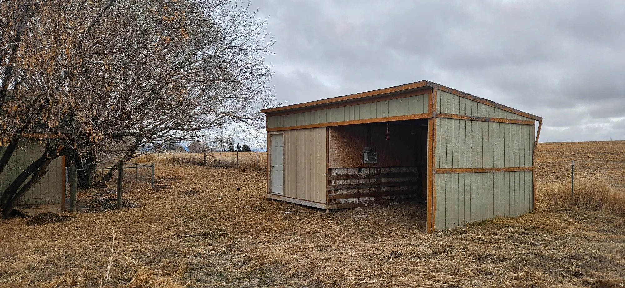View of shed featuring a view of rural / pastoral area