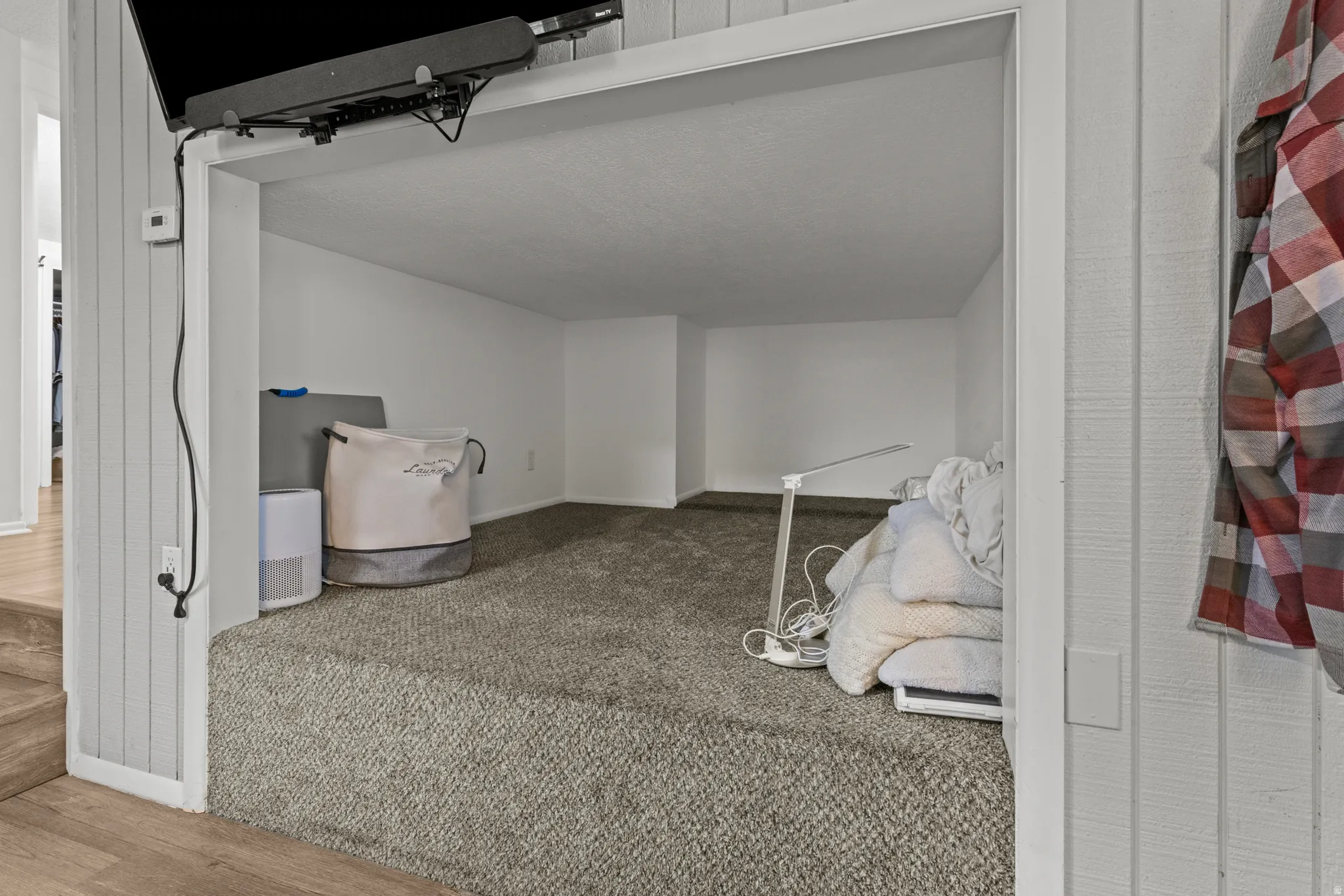 Unfurnished bedroom with baseboards