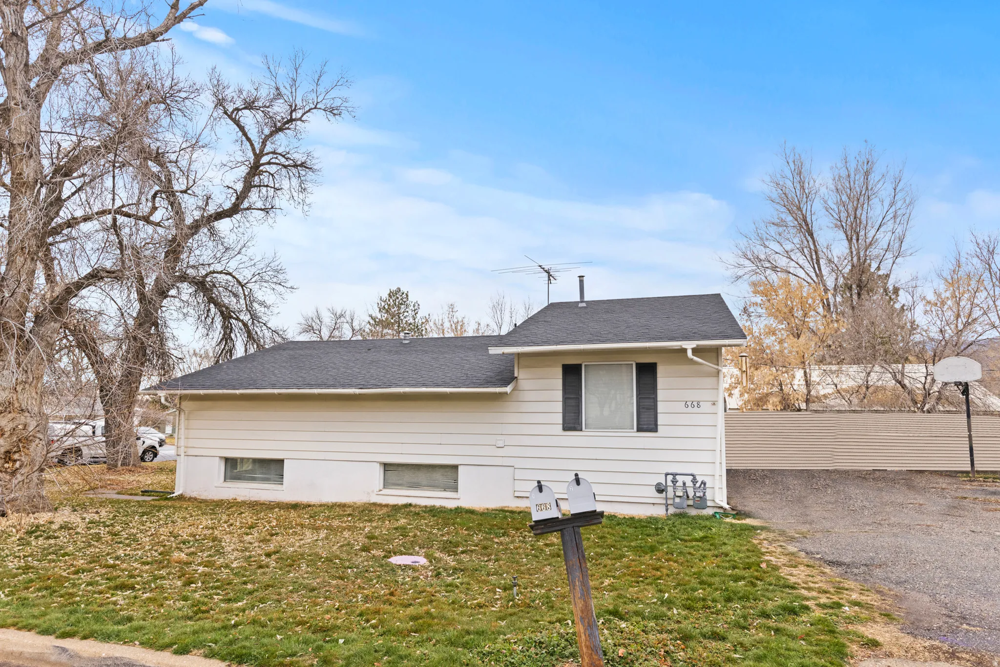 View of front of property featuring roof with shingles