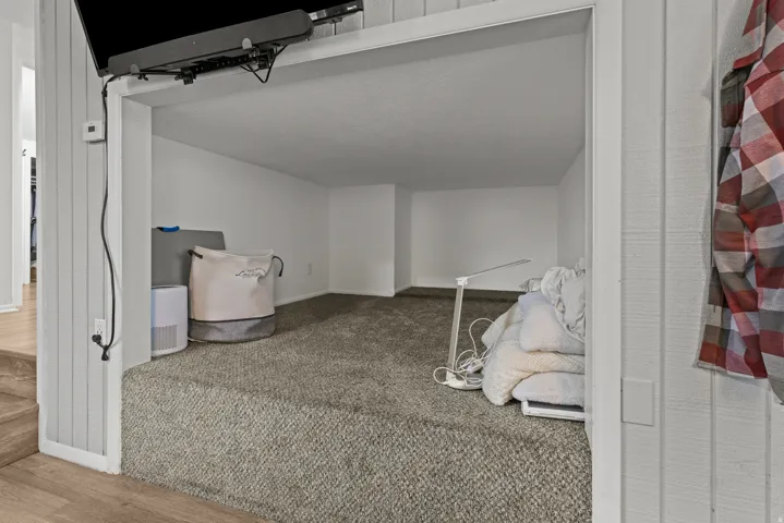 Unfurnished bedroom with baseboards
