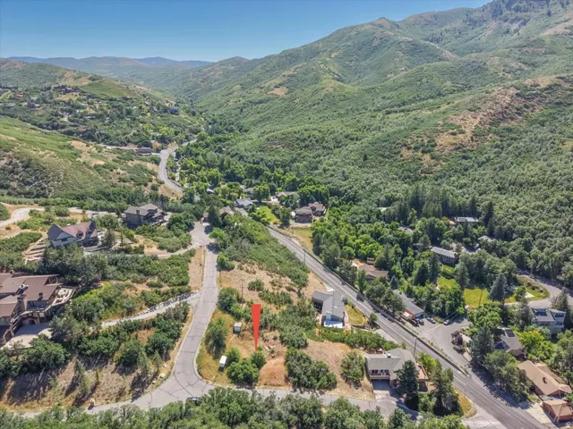 Expansive mountain terrain with a clear sky backdrop