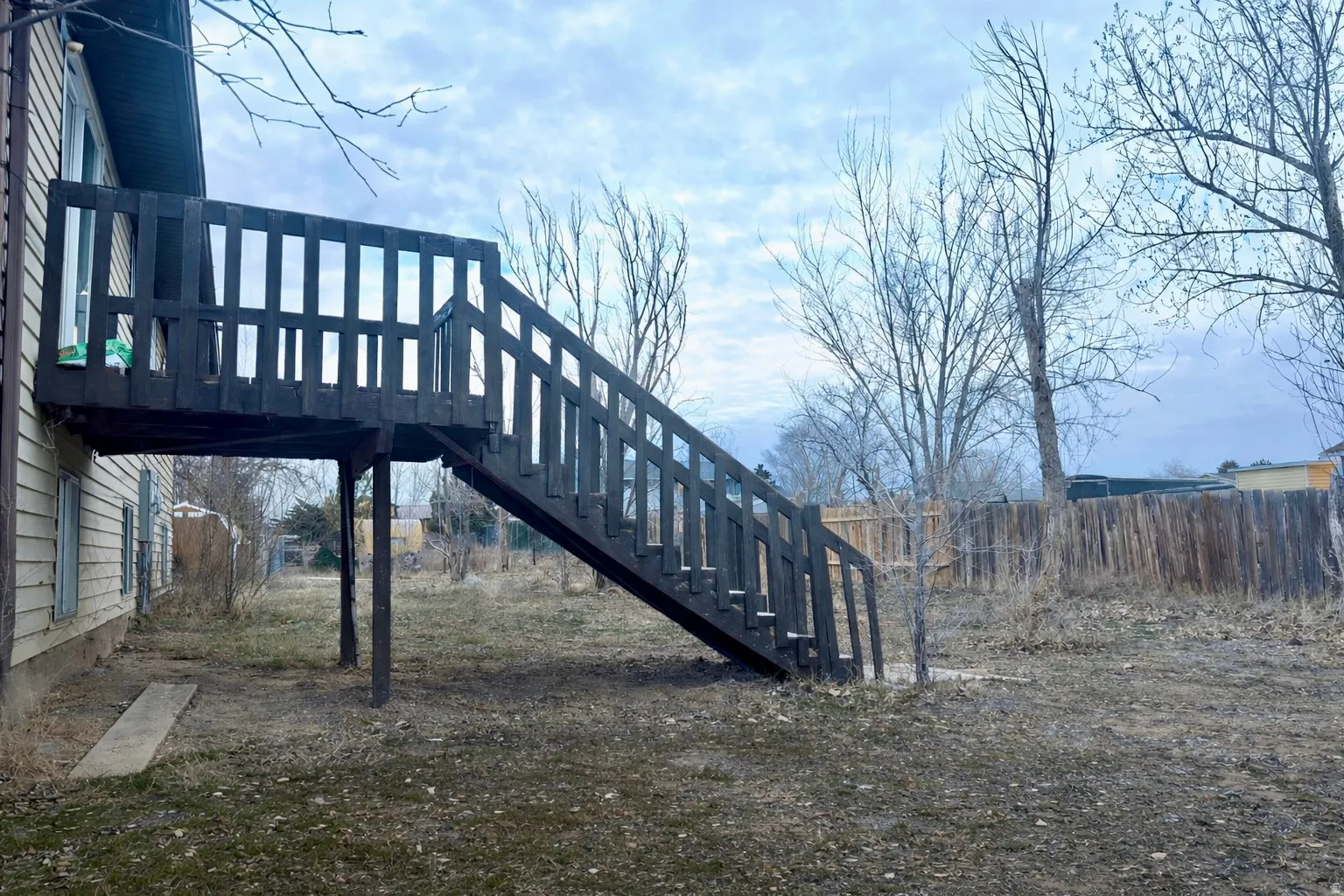View of yard featuring stairs