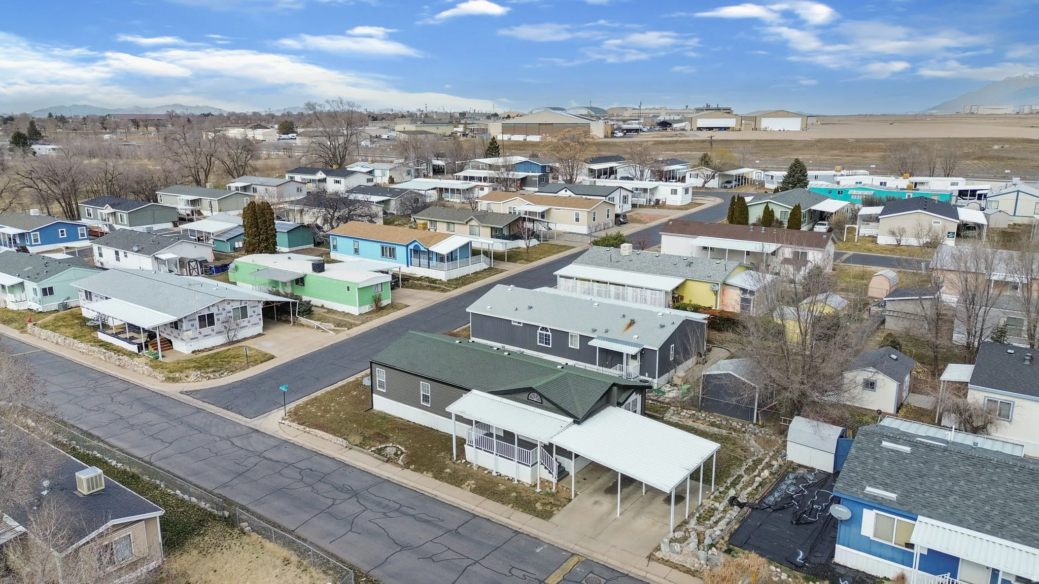 Aerial perspective of suburban area with mountains