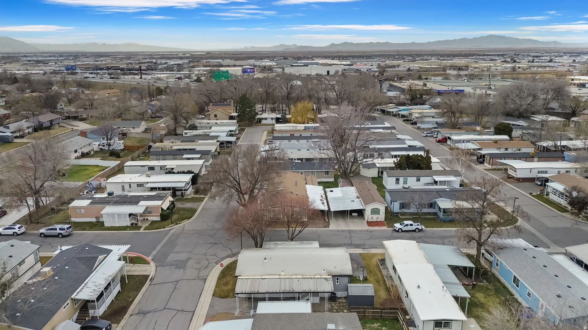 Aerial view of residential area with a mountainous background