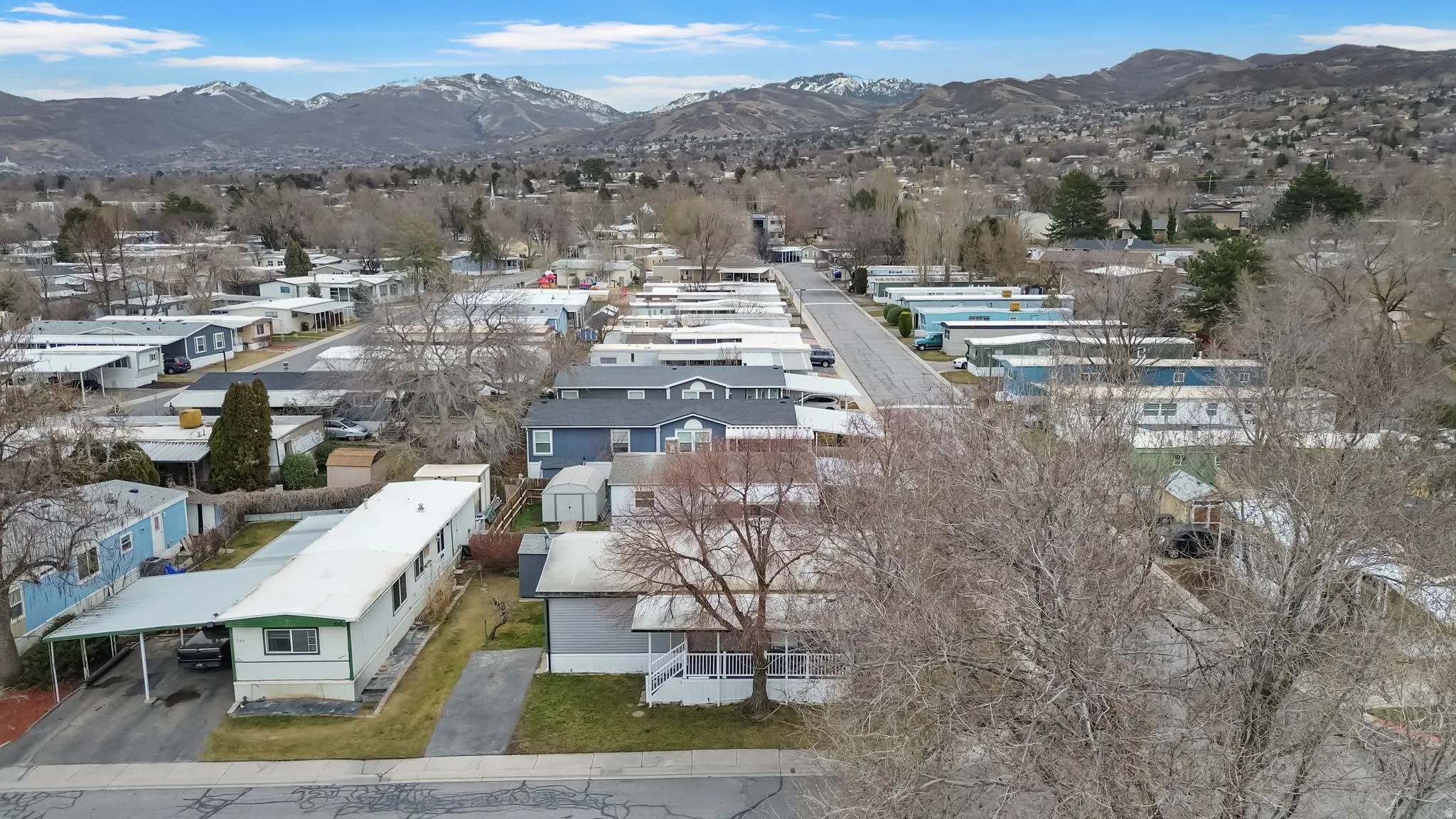 Aerial perspective of suburban area featuring mountains