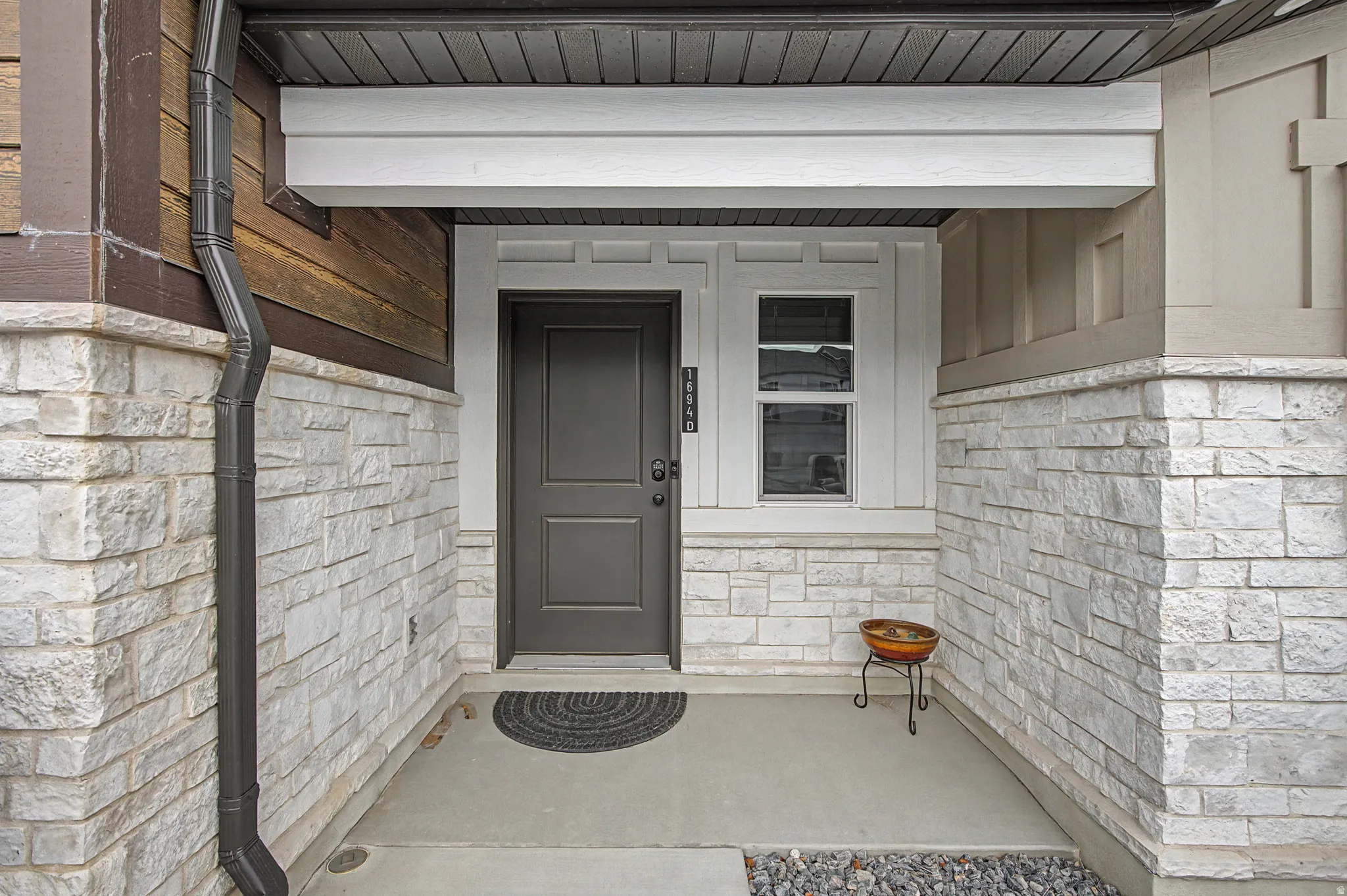Front door entrance with covered