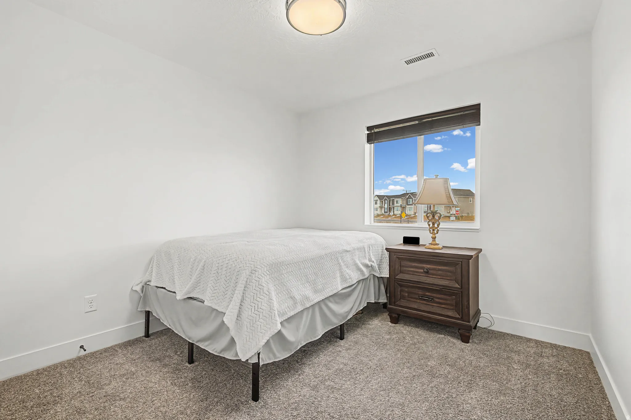 Carpeted guest bedroom #2