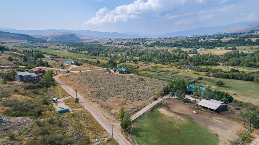 View of property location featuring rural landscape and a mountainous background