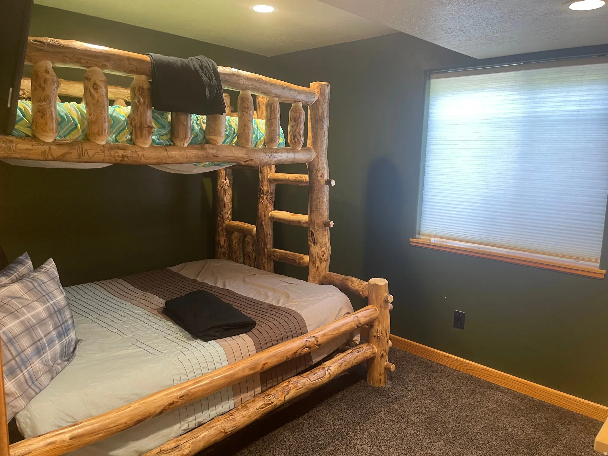 Bedroom featuring carpet and recessed lighting