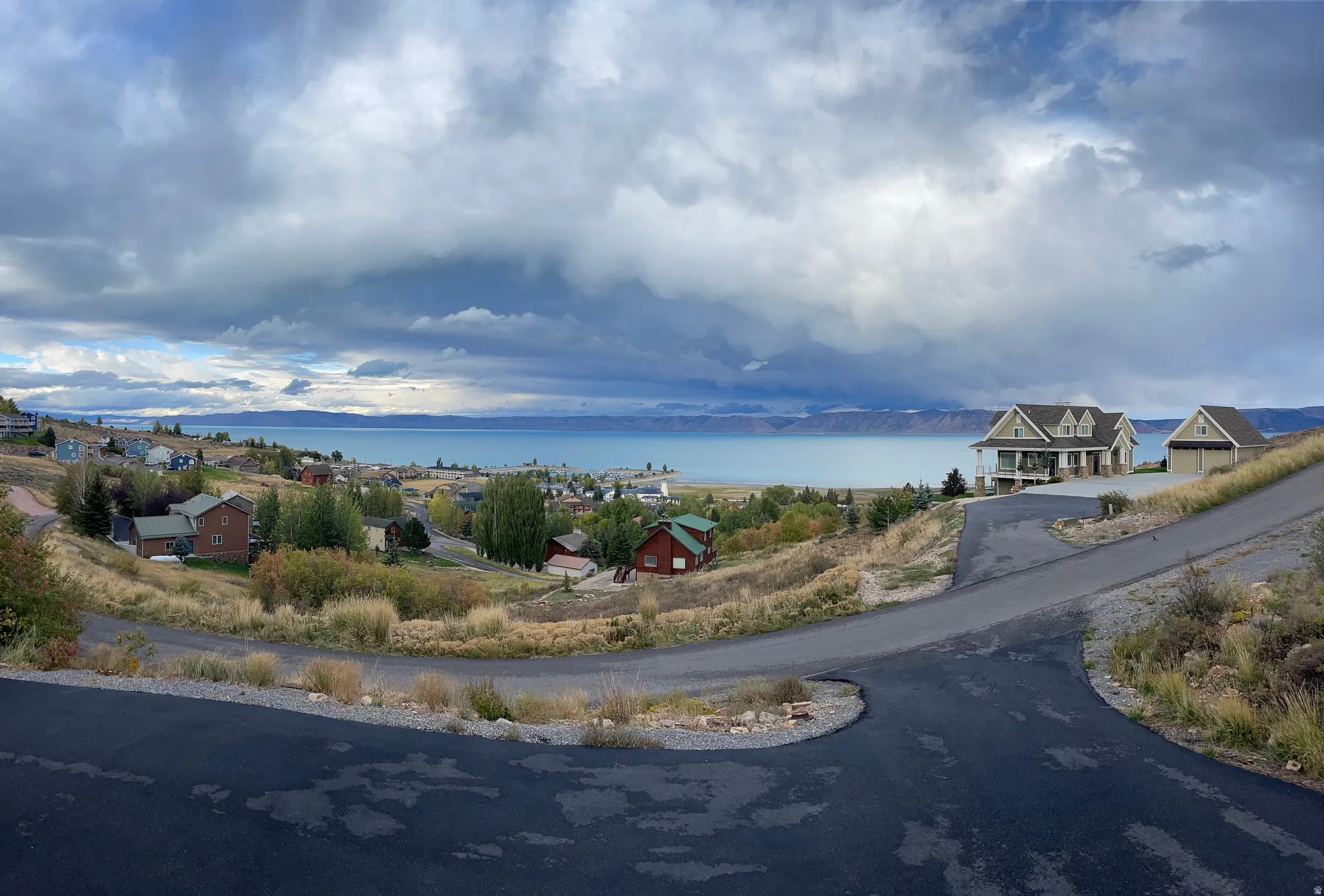 View of asphalt street with a water view