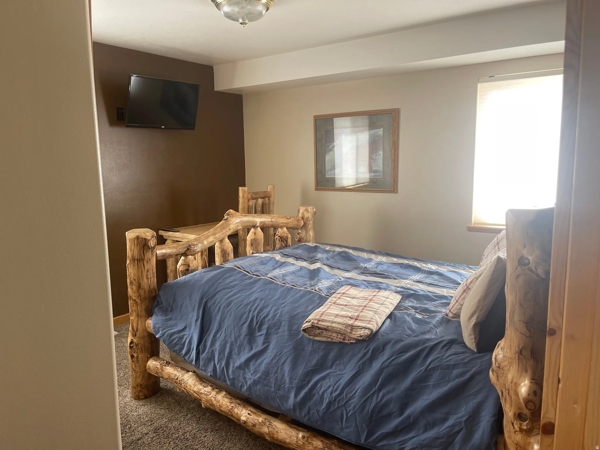 Bedroom featuring carpet floors