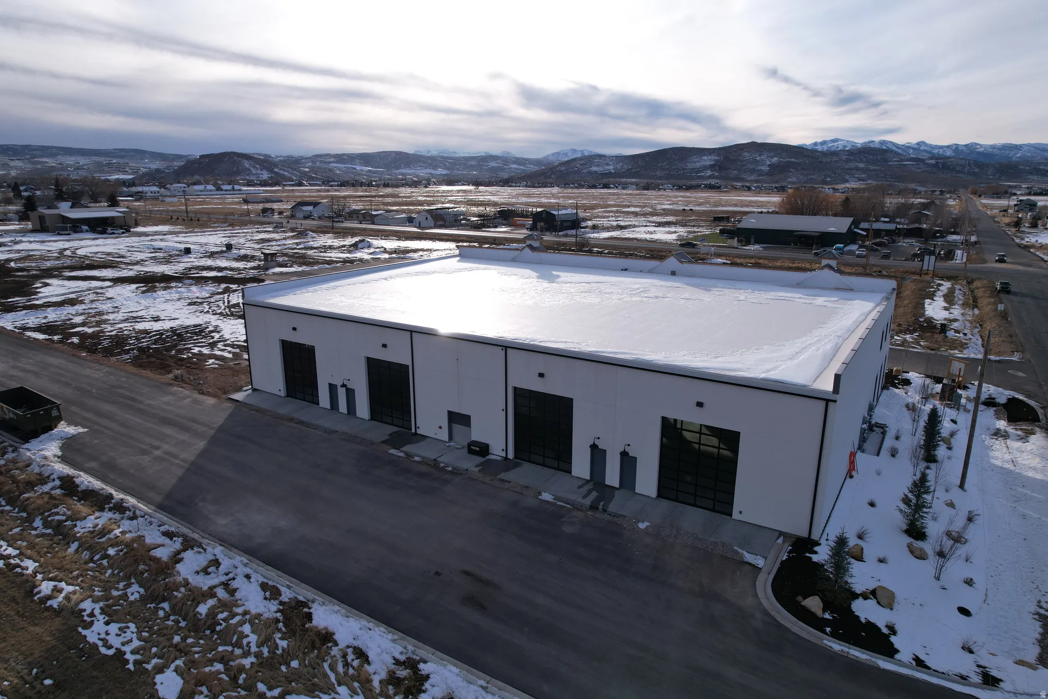 Snow covered property featuring a mountain view