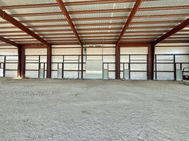 Garage featuring metal wall