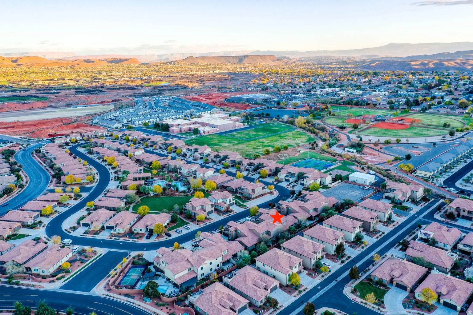 Aerial view of property's location featuring mountains