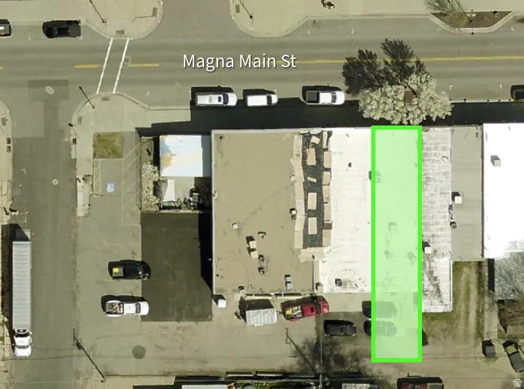 Aerial view of property's location featuring property parcel outlined