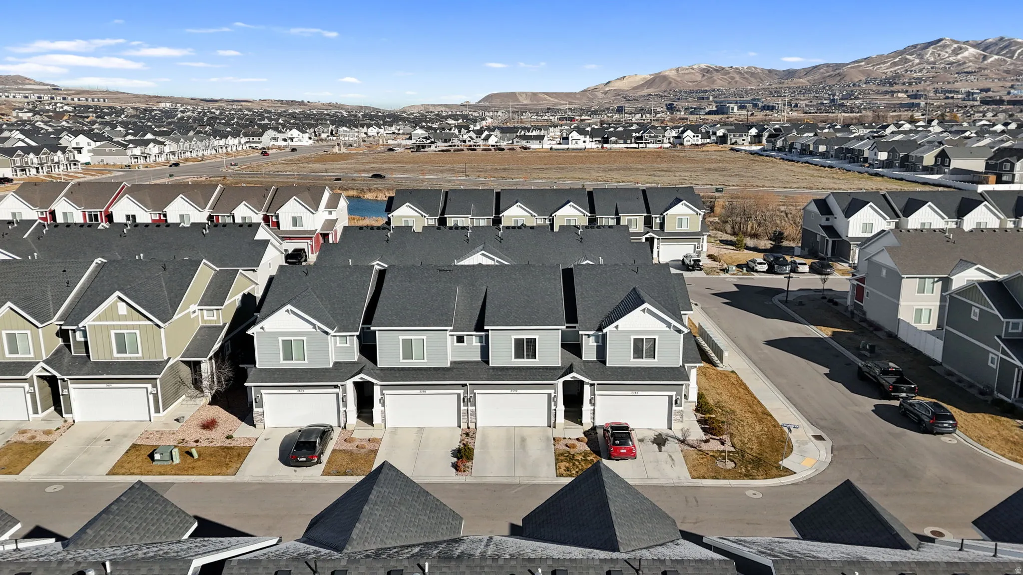 Aerial view of residential area with a mountain backdrop