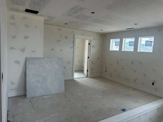 Empty room with baseboards