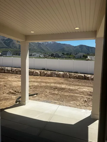 Covered patio featuring recessed lighting