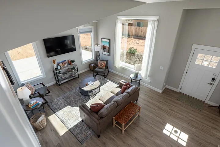 Living room with wood finished floors and baseboards