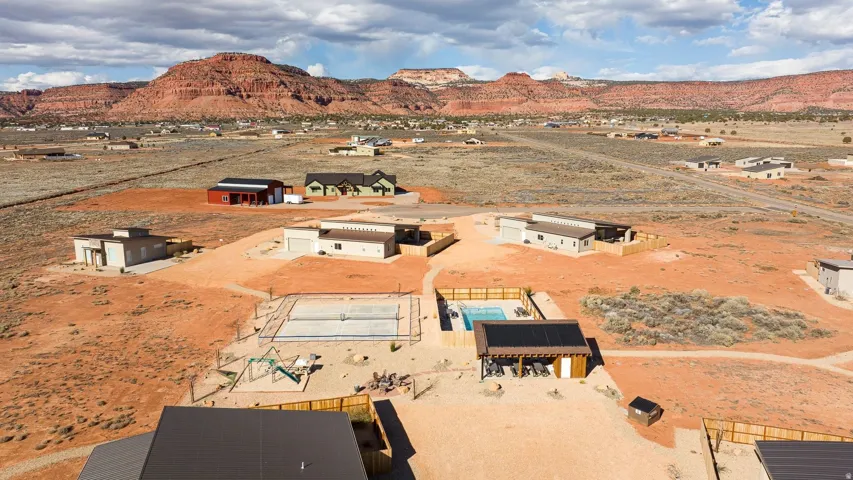 Aerial view of residential area with a mountain backdrop