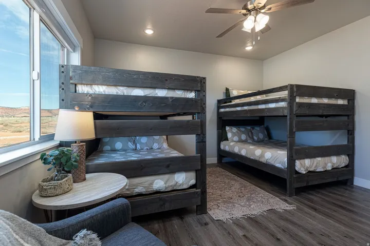 Bedroom featuring dark wood-type flooring, a ceiling fan, and recessed lighting