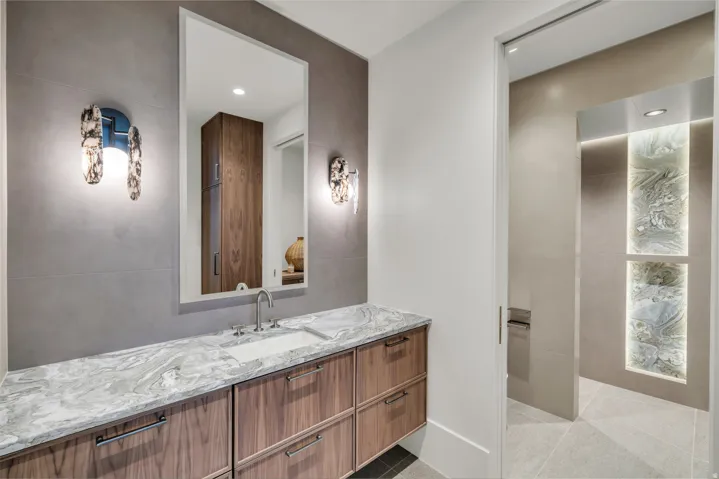 Bathroom featuring vanity, recessed lighting, and light tile patterned floors