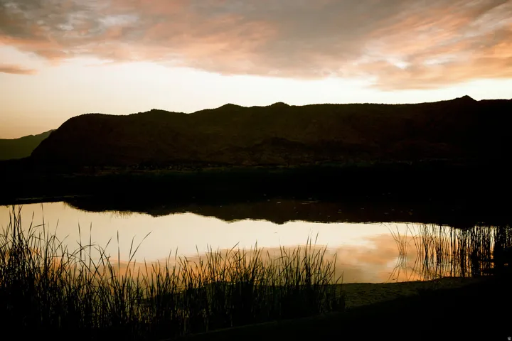 Mountain view featuring a large body of water