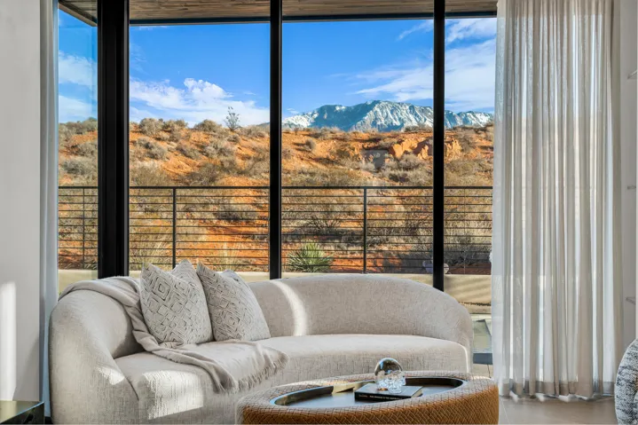 Sunroom with a mountain view