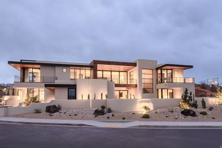 Contemporary home featuring stucco siding