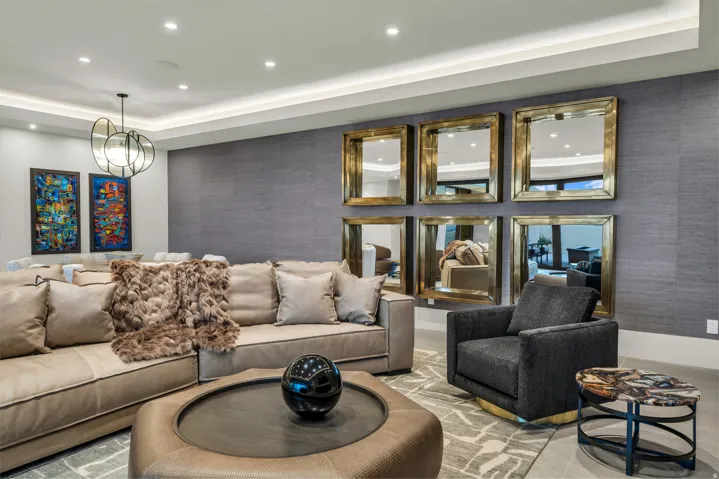 Lobby featuring a tray ceiling and recessed lighting