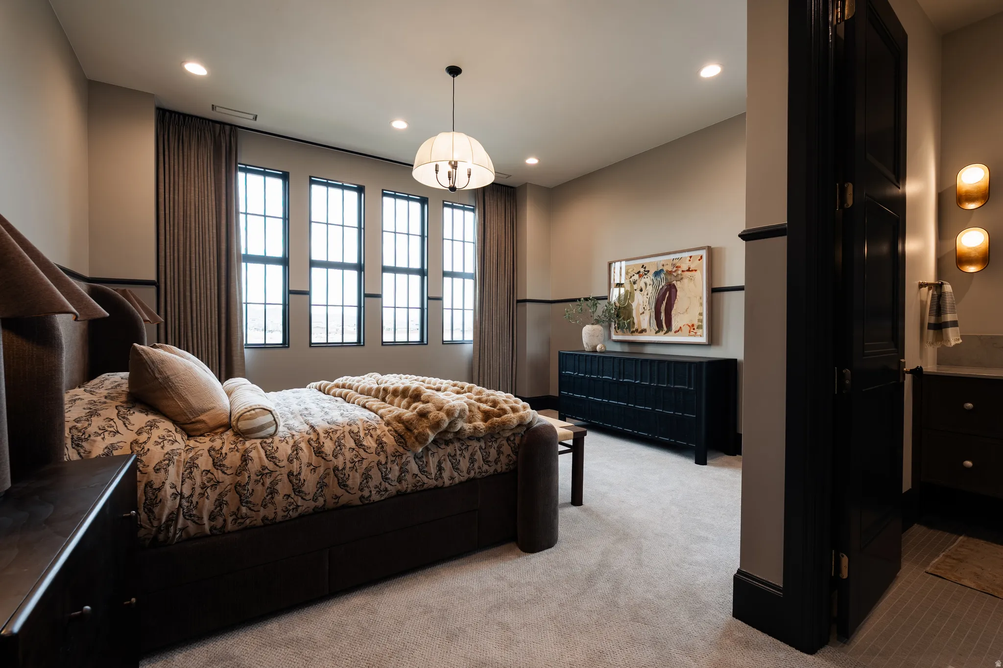 Bedroom featuring light carpet and recessed lighting