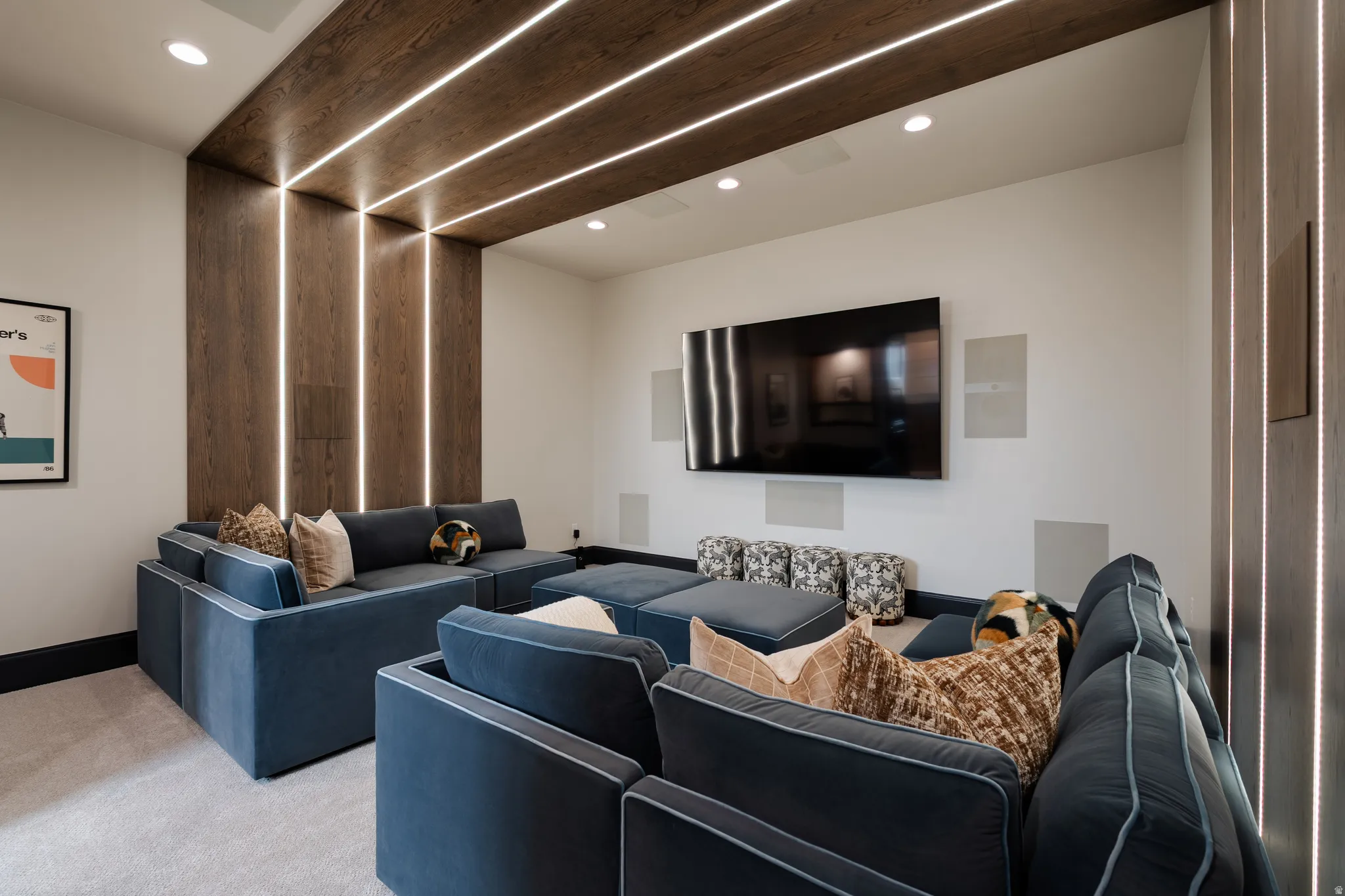 Cinema room with recessed lighting and carpet flooring