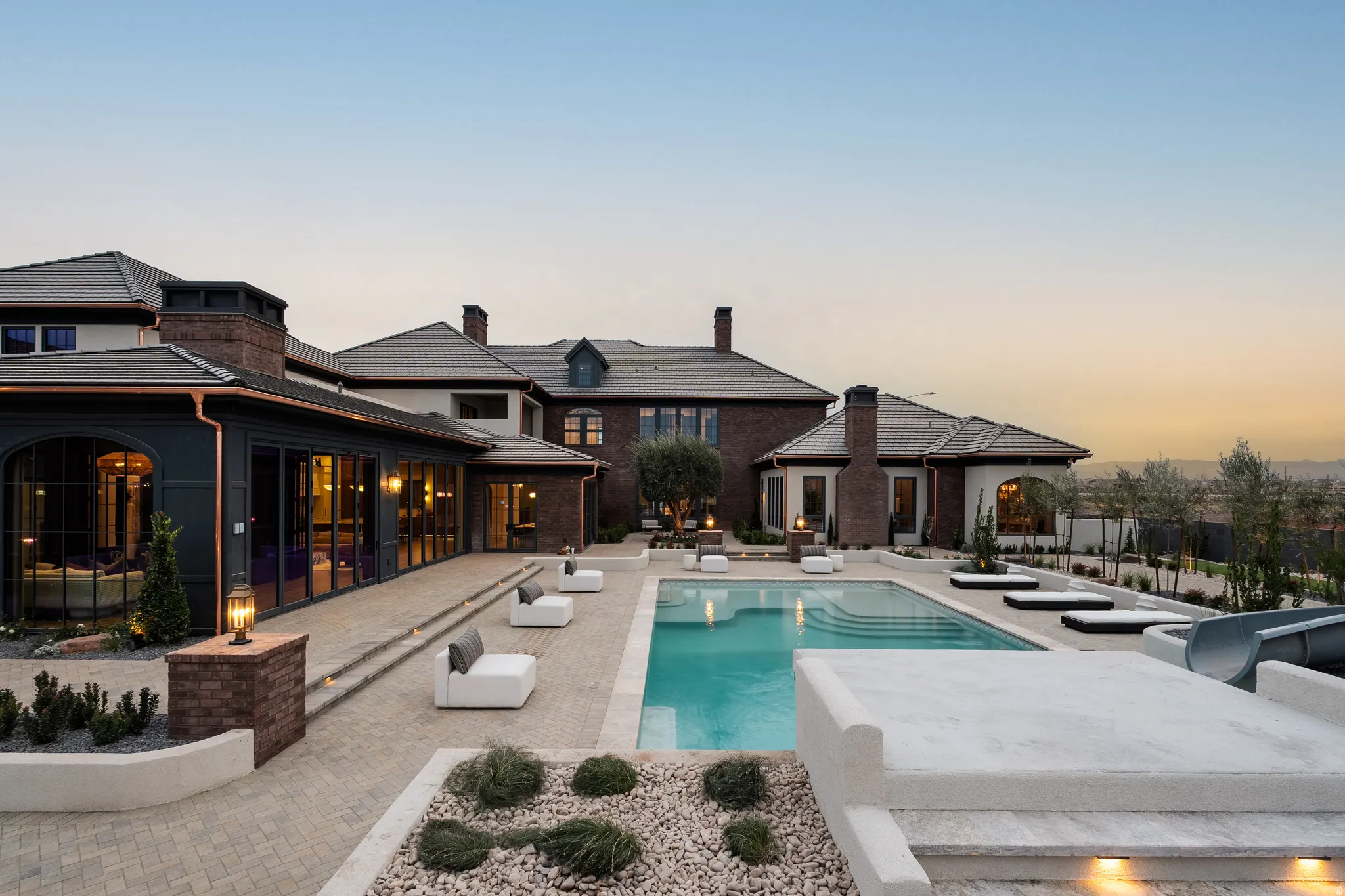 Back of house with a patio