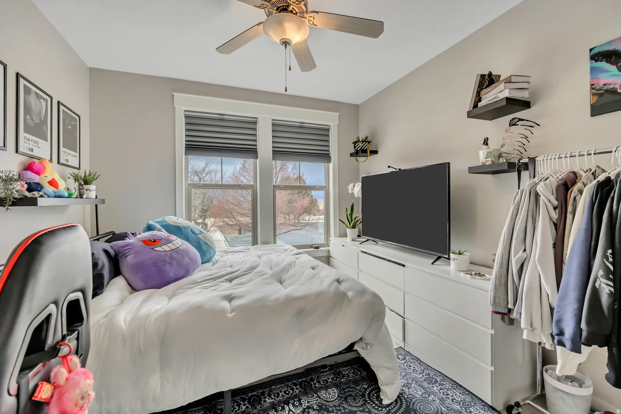 Bedroom featuring a ceiling fan